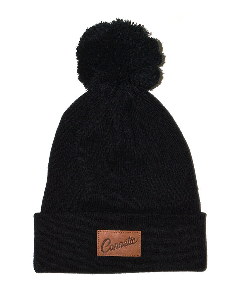 The Connetic Classic Leather Script Puff Beanie Pom Beanie in Black